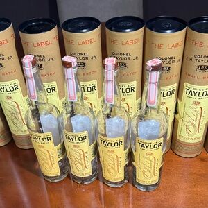 Ten Colonel E.H. Taylor Bourbon Whiskey Small Batch Boxes and Four Empty Tubes.